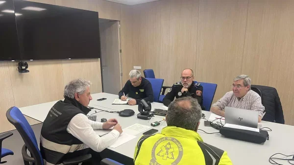 Antonio Domingo Ayuso en una reunion de coordinacion el primero por la derecha